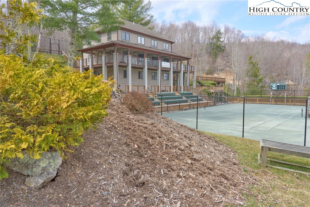 217 Overbrook Trail Beech Mountain, NC 28604 - Photo 9 of 16 a view of a house with backyard