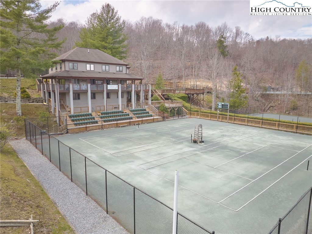 217 Overbrook Trail Beech Mountain, NC 28604 - Photo 10 of 16 a front view of a house with a yard