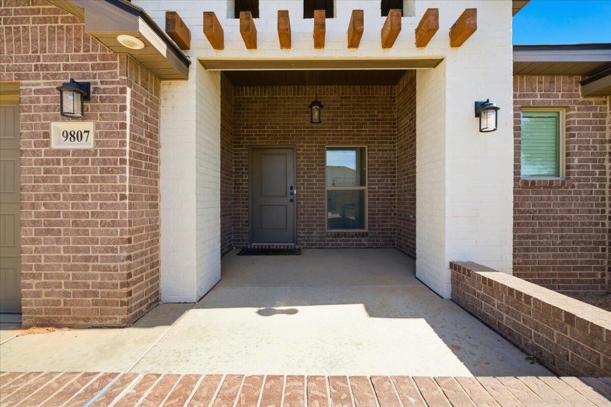 9807 Virginia Avenue Lubbock, TX 79424 - Photo 2 of 39 a view of entryway with a front door