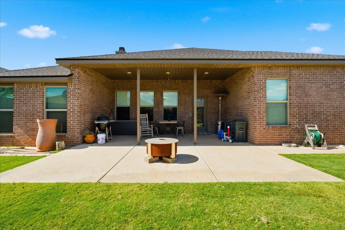 9807 Virginia Avenue Lubbock, TX 79424 - Photo 36 of 39 a view of outdoor space yard deck and patio