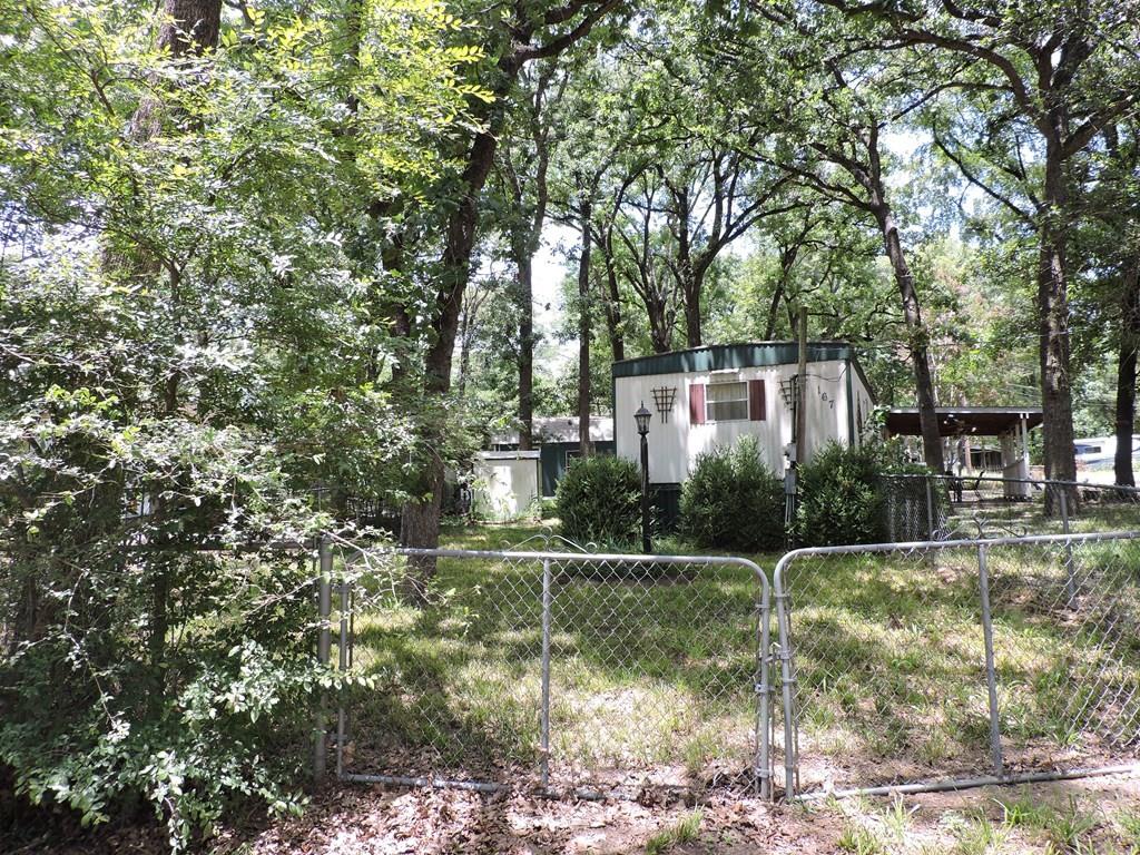 167 Bay Drive Mabank, TX 75156 - Photo 4 of 11 a balcony with yard