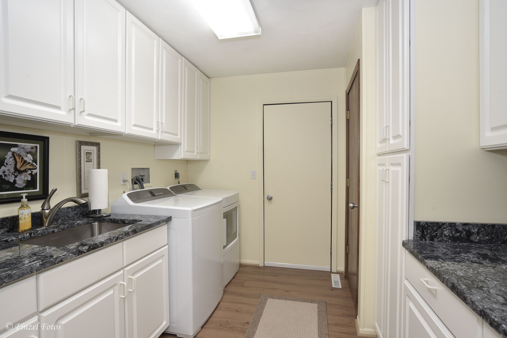 7405 Maxon Road Harvard, IL 60033 - Photo 13 of 30 a kitchen with granite countertop a sink stove and cabinets