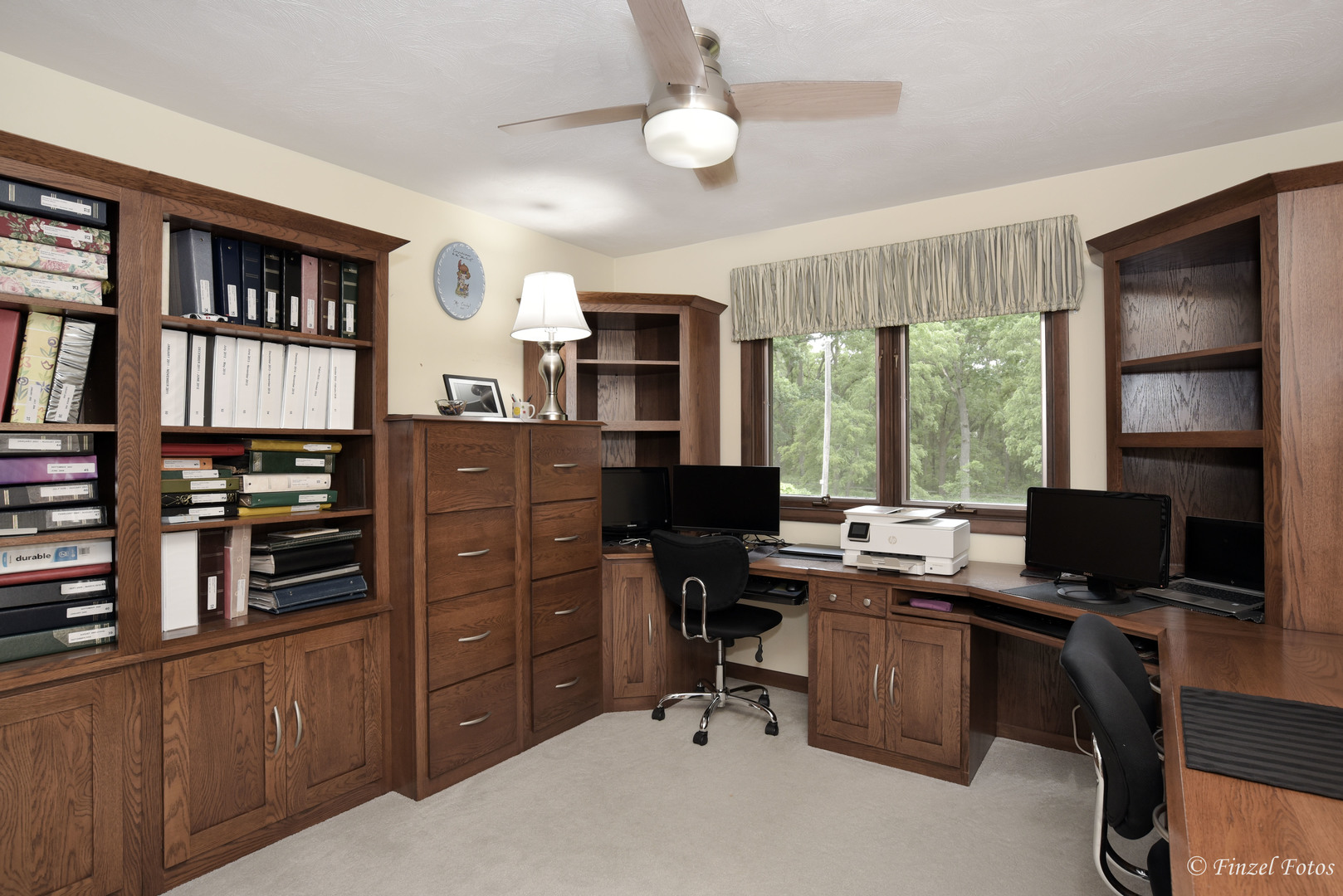 7405 Maxon Road Harvard, IL 60033 - Photo 19 of 30 a view of a workspace with furniture and a bookshelf