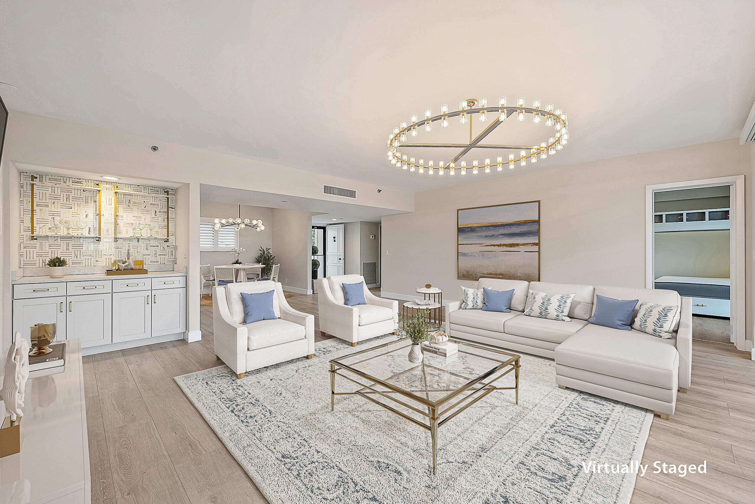 16910 Bay Street, Unit E204 Jupiter, FL 33477 - Photo 16 of 27 a living room with furniture a dining table and a rug