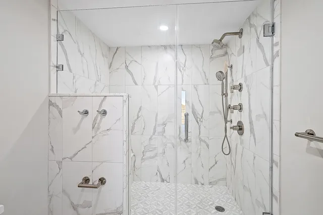 a kitchen with stainless steel appliances a refrigerator sink and cabinets