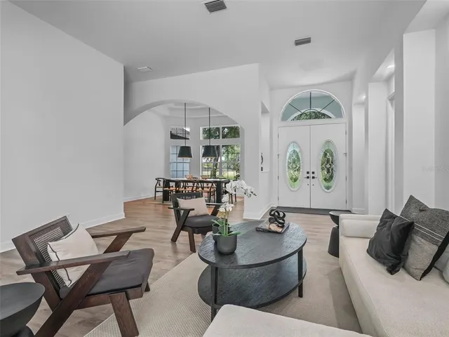 a kitchen with a sink stove and refrigerator