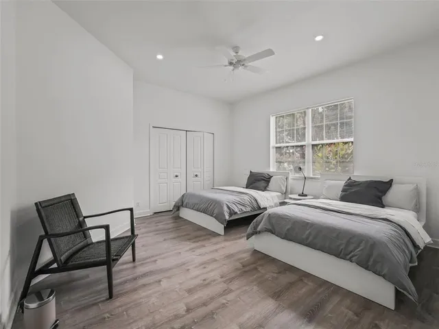a bathroom with a toilet sink and a mirror