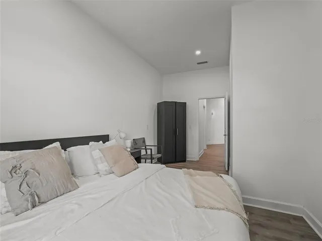 a view of a porch with furniture and garden