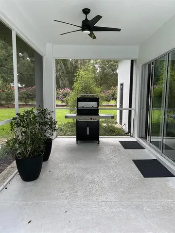 a view of a storage and utility room with washer and dryer
