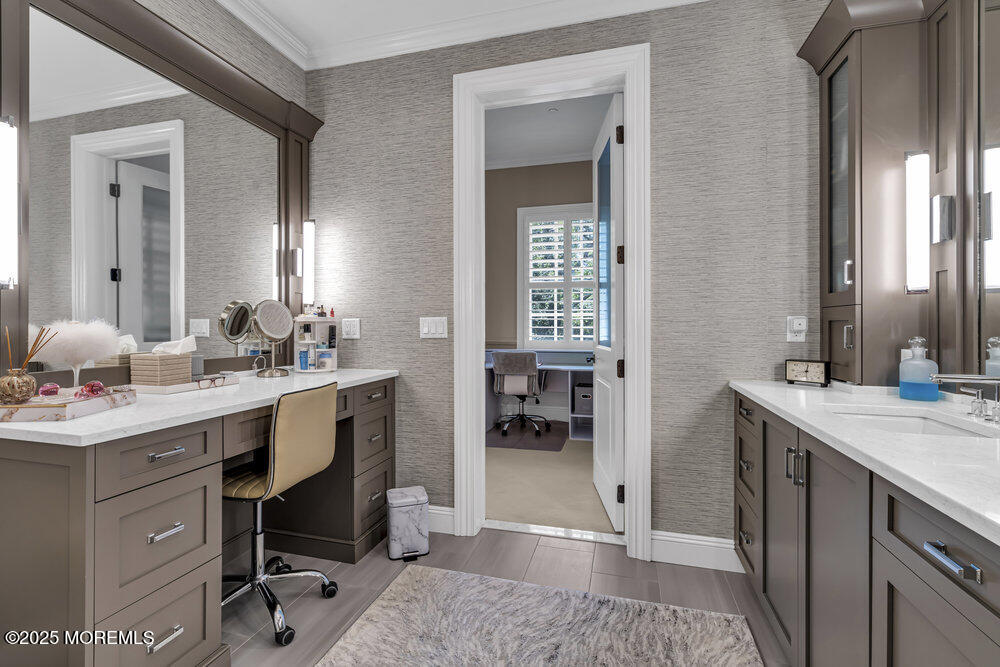 1222 Oval Road Manasquan, NJ 08736 - Photo 46 of 77 a view of a bathroom with dual sinks