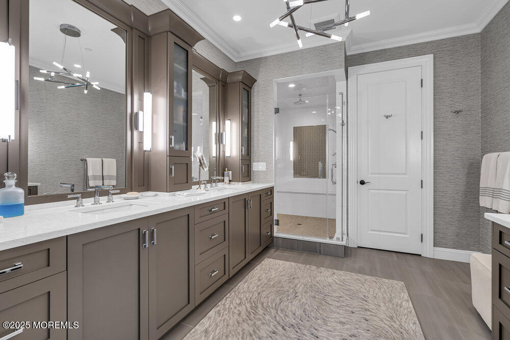 1222 Oval Road Manasquan, NJ 08736 - Photo 47 of 77 a spacious bathroom with a double vanity sink mirror and double