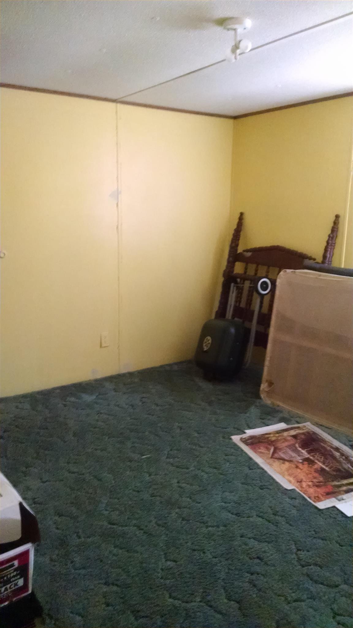 1535 Maddox Road Centerville, TN 37033 - Photo 12 of 26 a room with a rug
