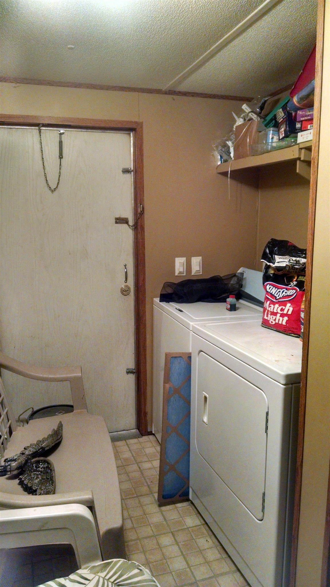 1535 Maddox Road Centerville, TN 37033 - Photo 15 of 26 a utility room with dryer and washer