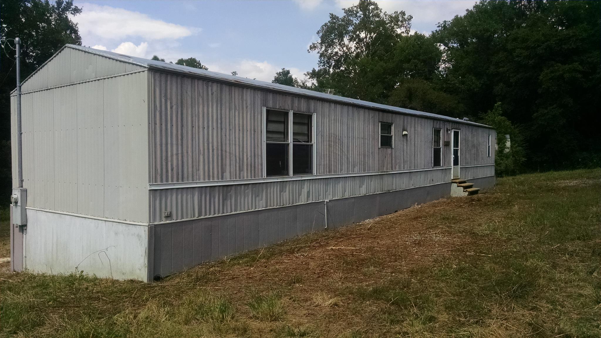 1535 Maddox Road Centerville, TN 37033 - Photo 23 of 26 a backyard of a house