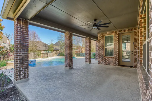 a view of empty room with floor to ceiling window