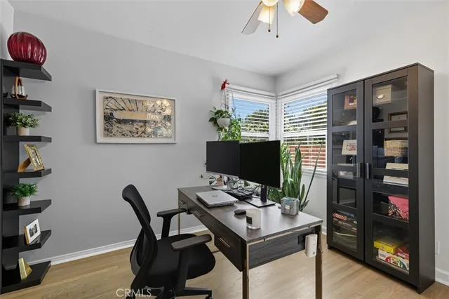 a view of a workspace with furniture