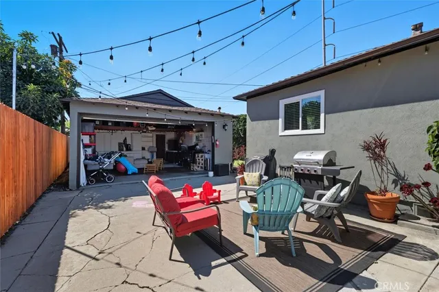 a view of a chairs and tables in the patio
