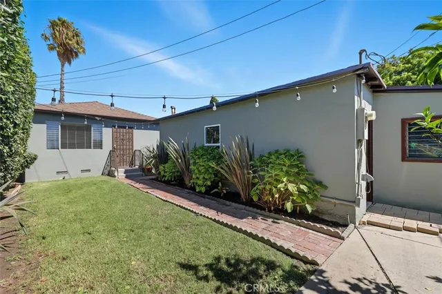 a house view with a garden space