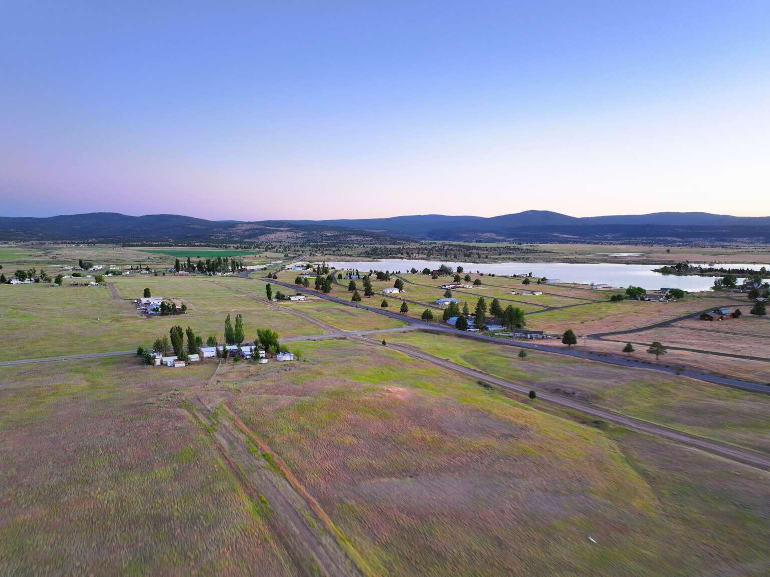202 Starpine Road Alturas, CA 96101 - Photo 6 of 13 a view of a lake with a mountain