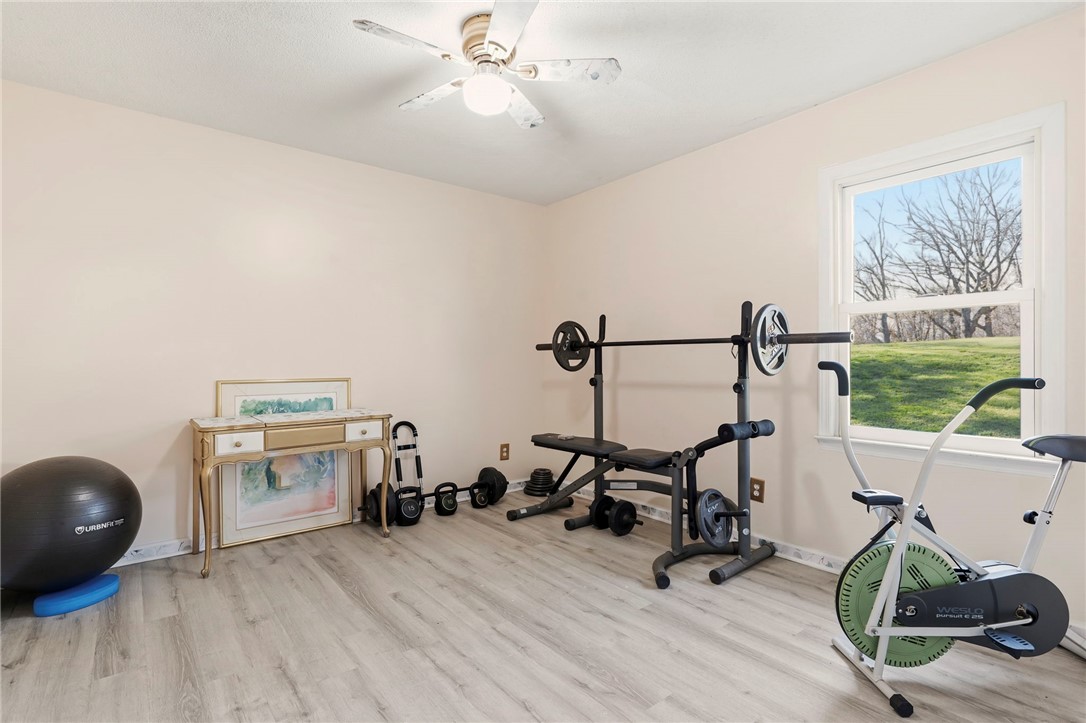 122 Latham Drive Anderson, SC 29621 - Photo 23 of 40 This versatile room offers ample space for a home gym or an adaptable flex area.