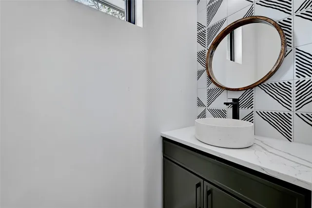 a patio with table and chairs