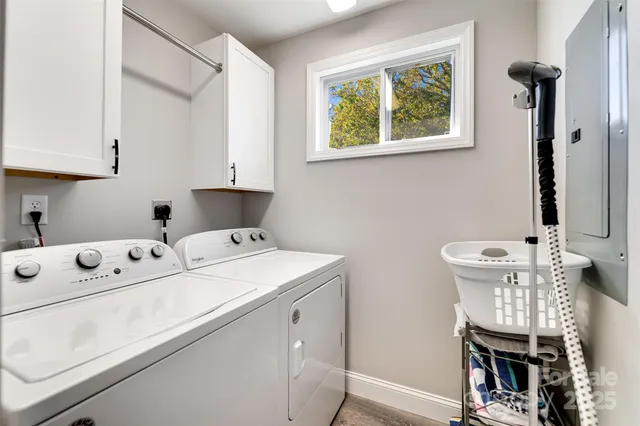 a utility room with closet dryer and washer