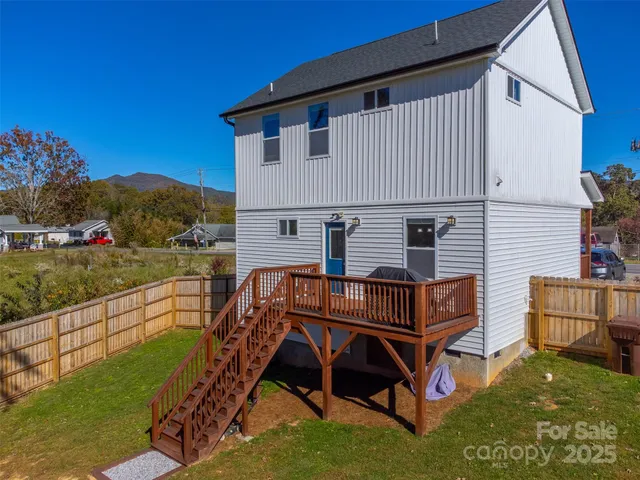 a house view with a garden space