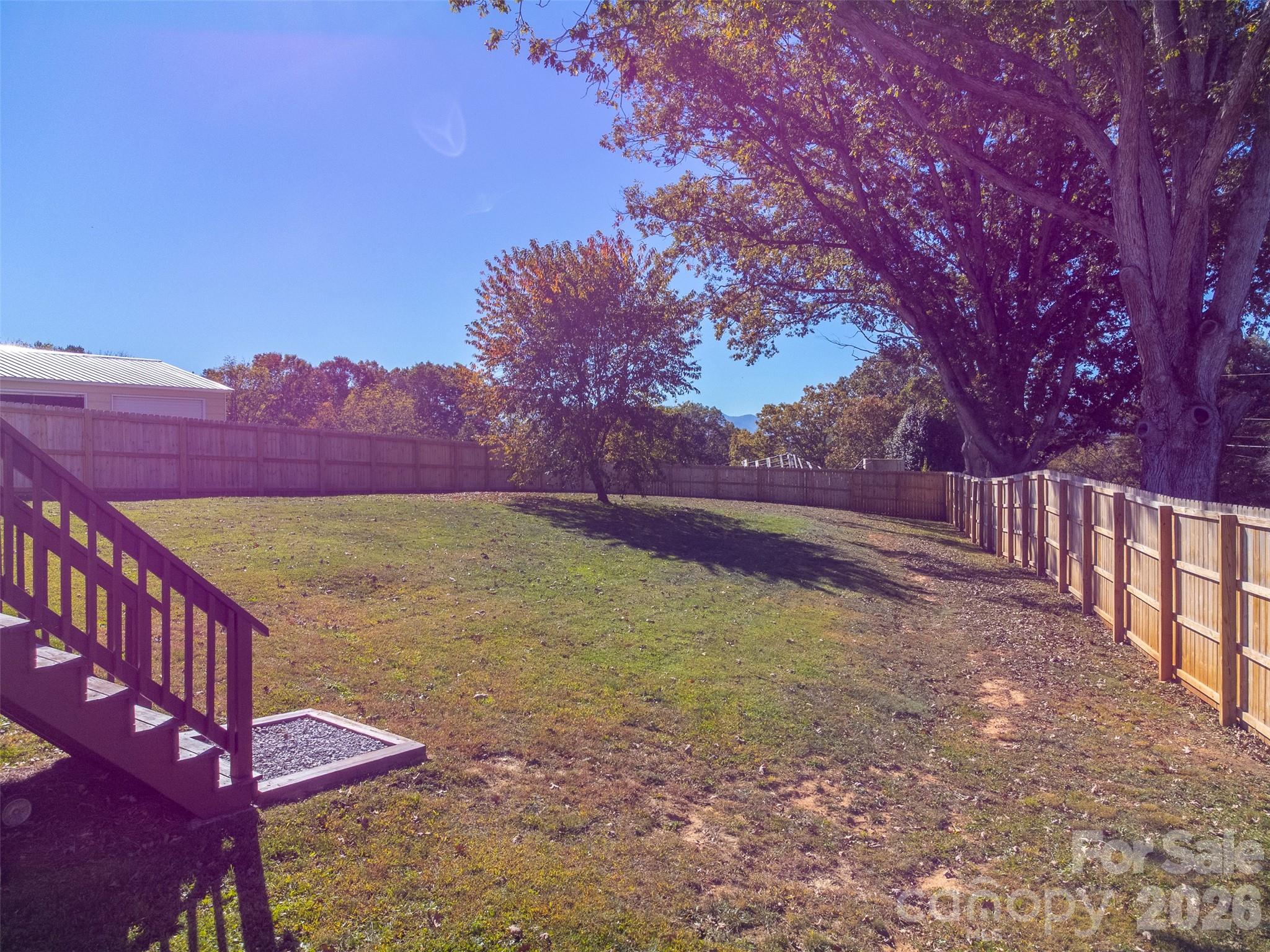 955 North Canton Road Canton, NC 28716 - Photo 35 of 48 a view of a yard with wooden fence