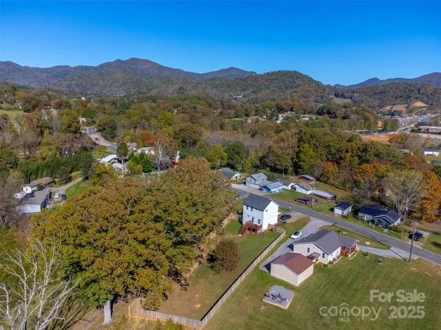 a view of a city with mountains in the background