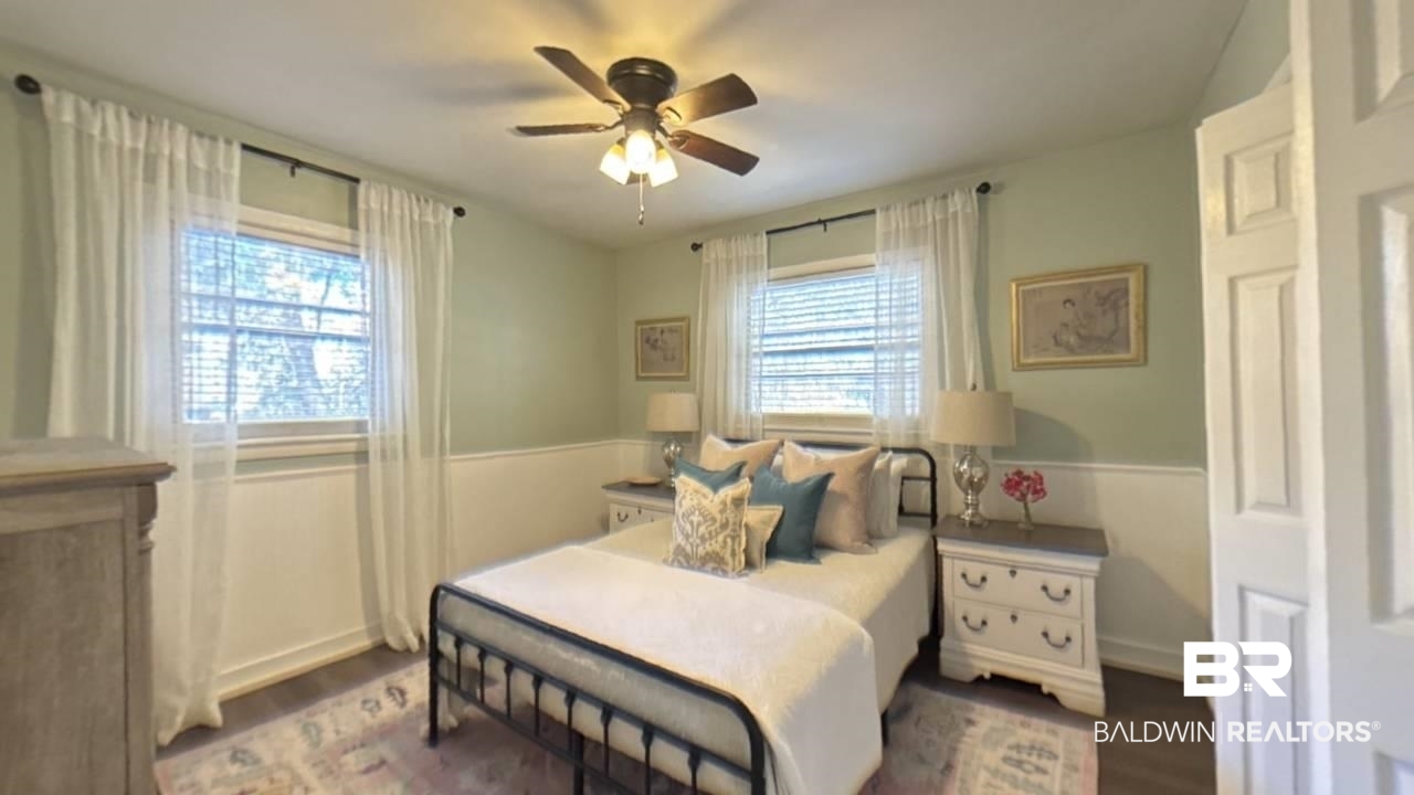 1703 Clark Avenue Bay Minette, AL 36507 - Photo 6 of 27 Bedroom with dark wood finished floors and ceiling fan