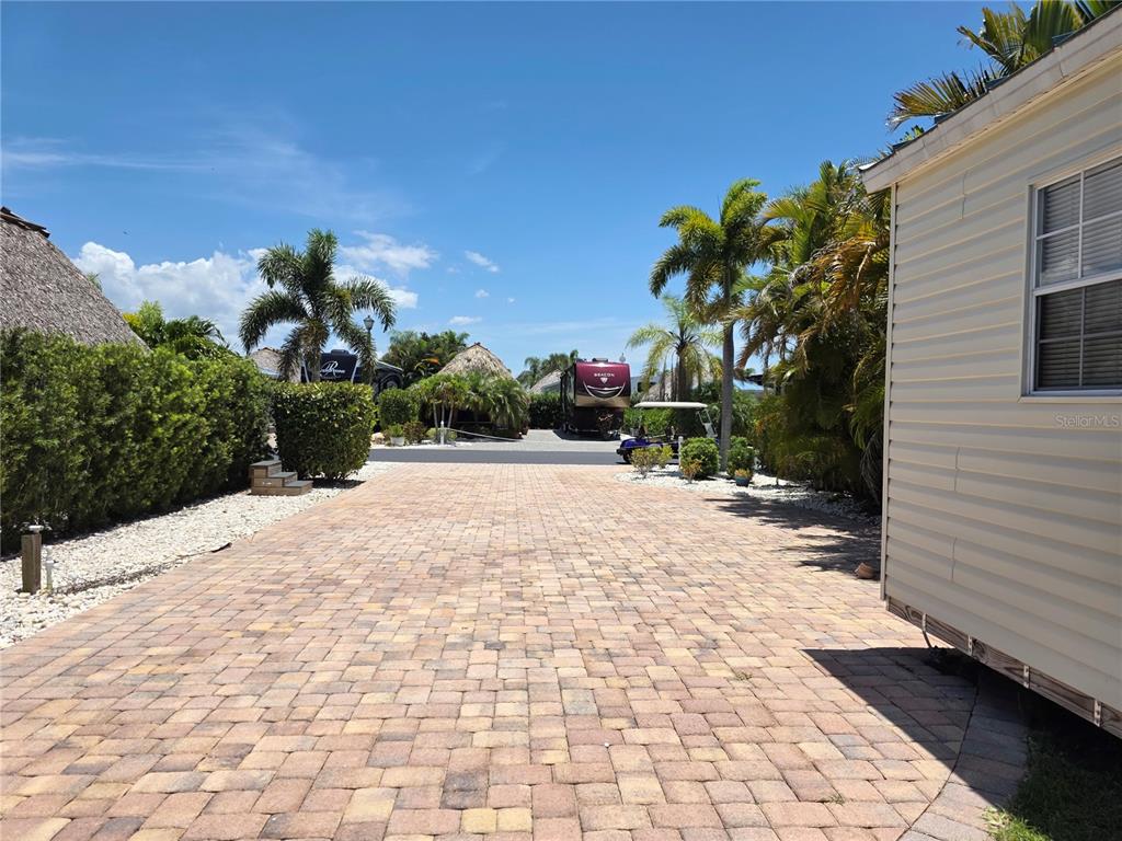 515 Southwest 39th Trace, Unit 89 Okeechobee, FL 34974 - Photo 5 of 12 a view of a backyard of the house