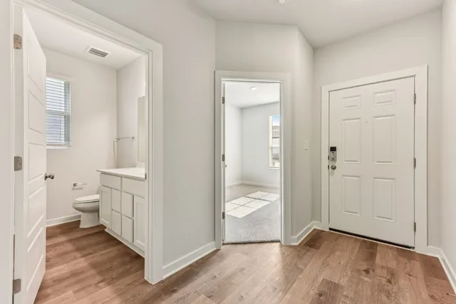 a view of a bathroom with a toilet and a sink