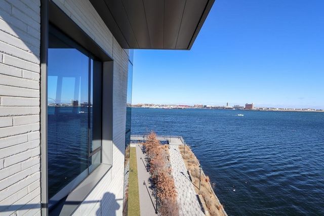 a view of backyard with outdoor seating