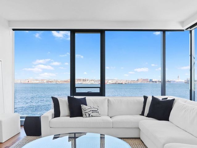 a living room with furniture city view