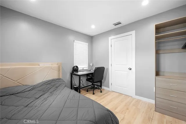 a workspace with furniture and a window