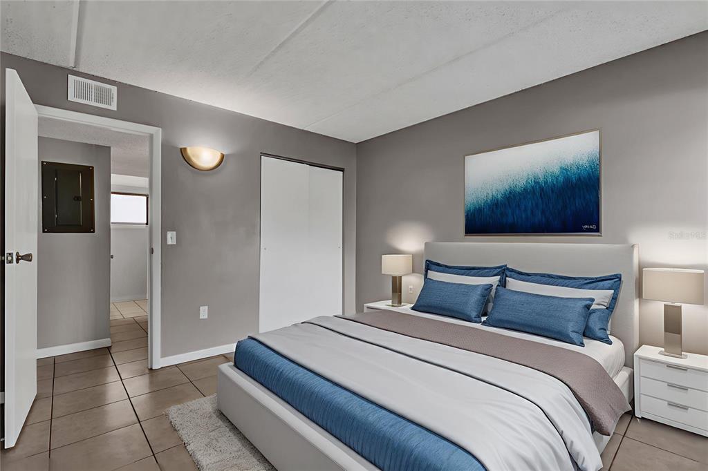 1108 Bartow Road, Unit 107 Lakeland, FL 33801 - Photo 4 of 12 a bedroom with bed and window