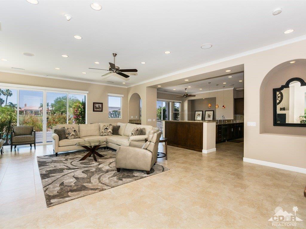 285 Loch Lomond Road Rancho Mirage, CA 92270 - Photo 1 of 48 a living room with furniture and large window