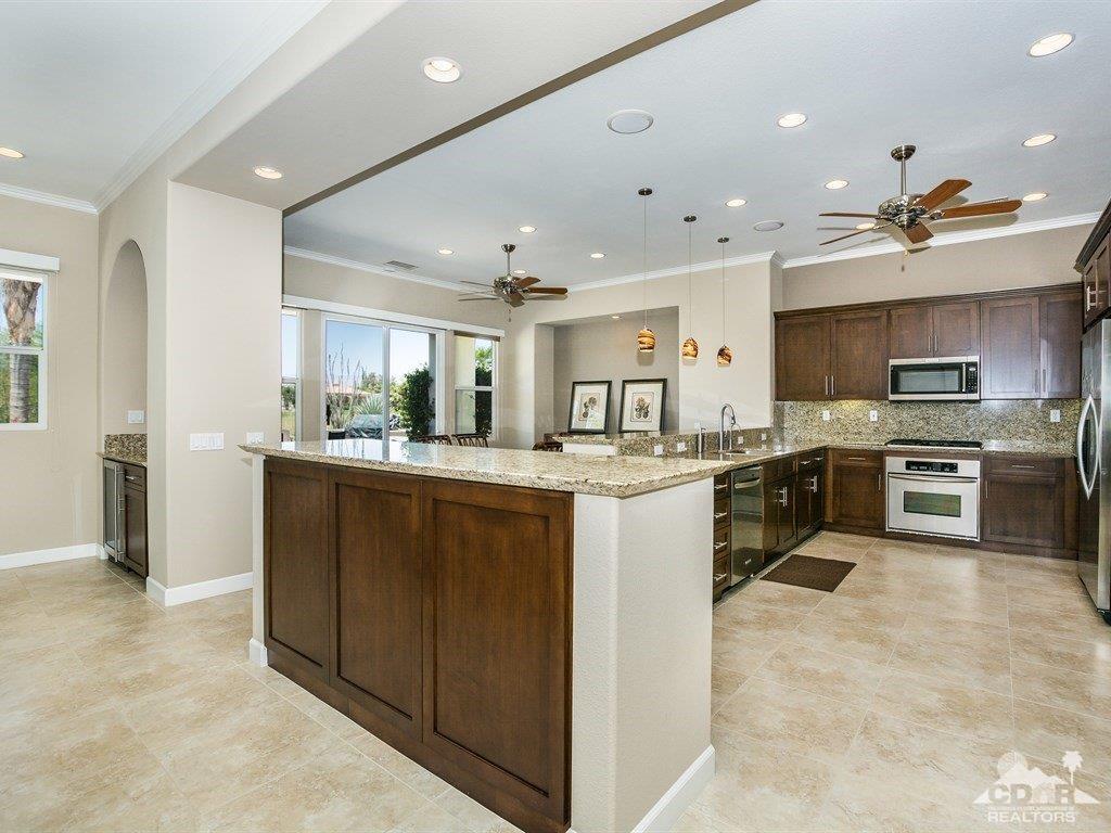 285 Loch Lomond Road Rancho Mirage, CA 92270 - Photo 12 of 48 a kitchen with counter top space cabinets and appliances