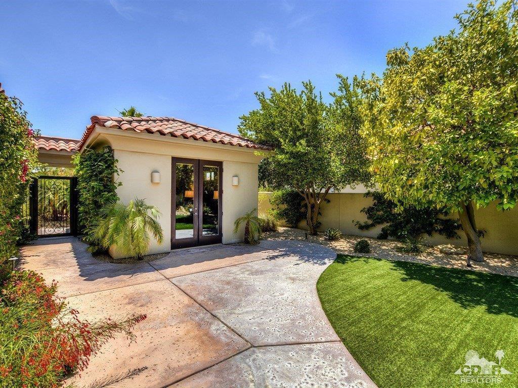 285 Loch Lomond Road Rancho Mirage, CA 92270 - Photo 25 of 48 a view of a house with a patio