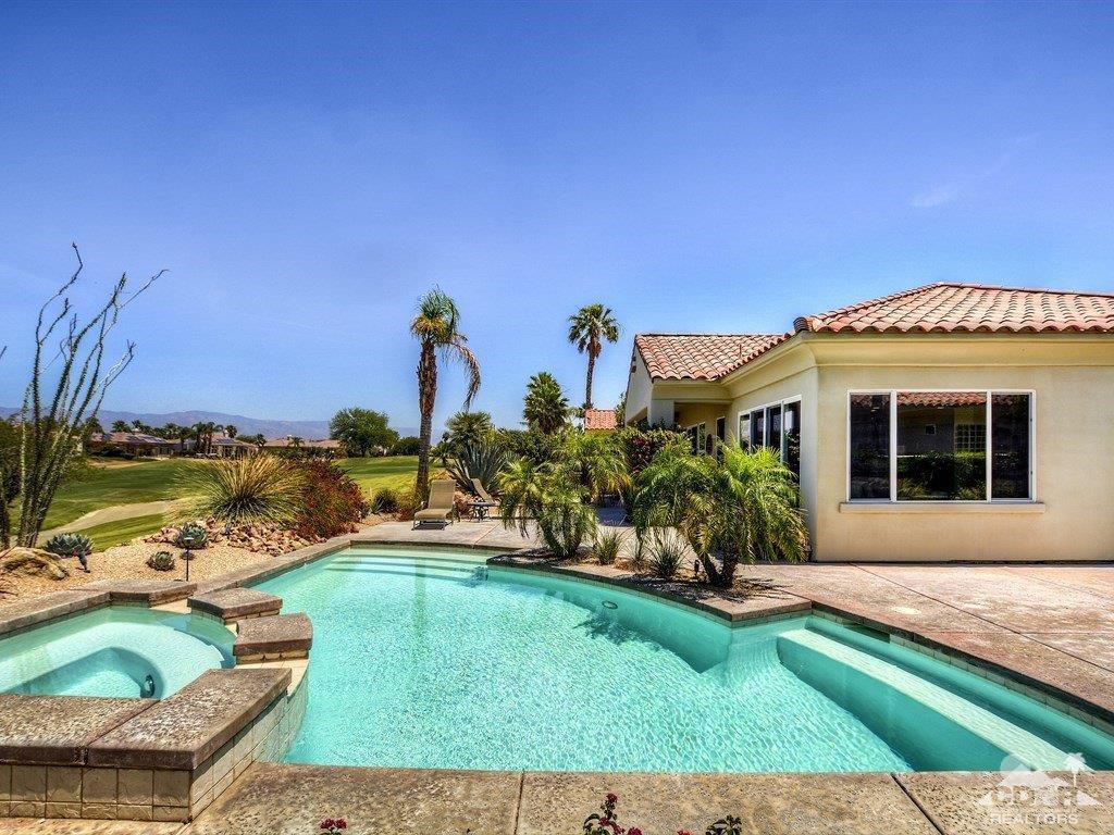 285 Loch Lomond Road Rancho Mirage, CA 92270 - Photo 34 of 48 a front view of a house with garden