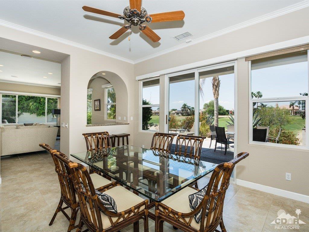 285 Loch Lomond Road Rancho Mirage, CA 92270 - Photo 9 of 48 a view of a dining room with furniture window and outside view