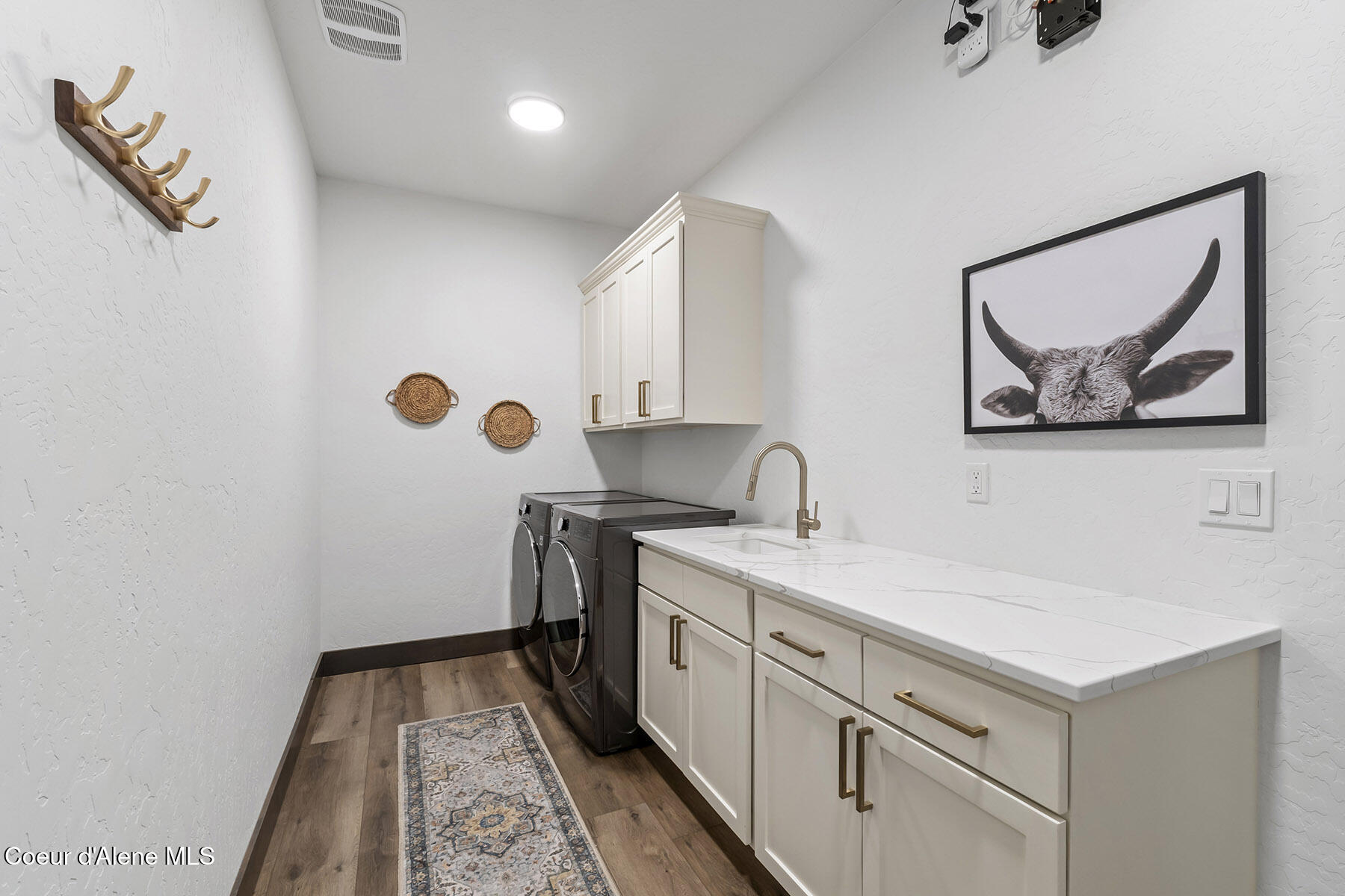 8781 West Seed Loop Rathdrum, ID 83858 - Photo 29 of 40 Spacious Laundry with Utility Sink