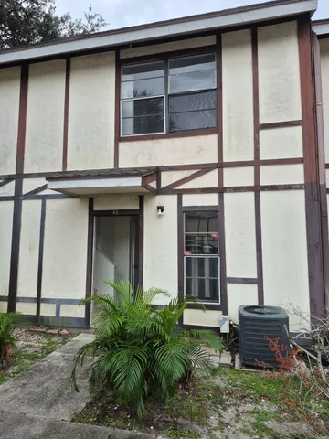 a house view with a outdoor space