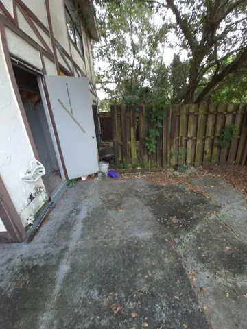 a view of backyard with green space