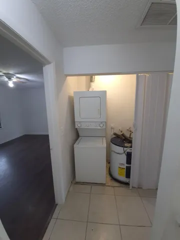 a storage room with washer and dryer