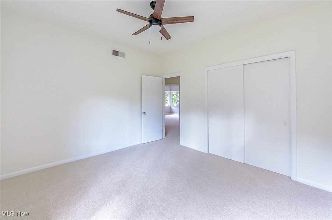 2445 Chatham Road Akron, OH 44313 - Photo 26 of 32 Neutral throughout with a nice-sized closet and ceiling fan.
