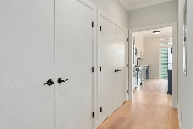 a view of a bathroom with a glass door shower