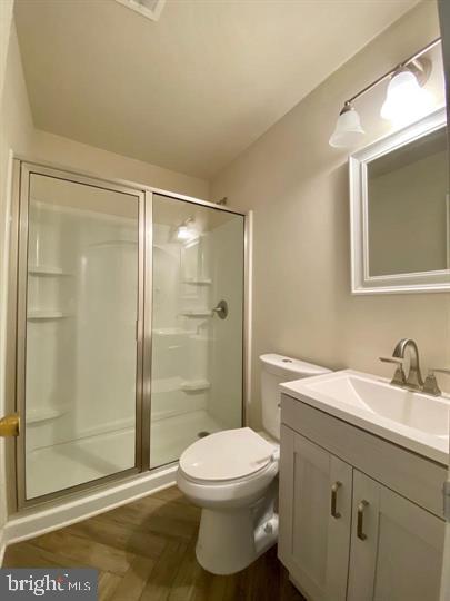 1103 Prince Edward Street, Unit 3 Fredericksburg, VA 22401 - Photo 9 of 9 a bathroom with a sink a toilet and shower