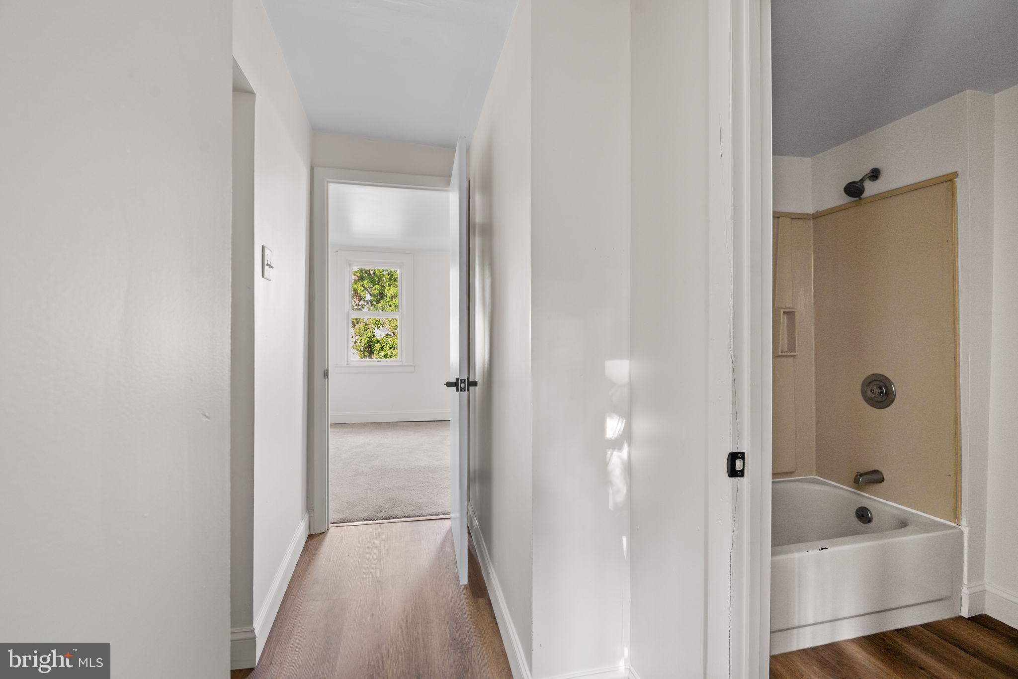 322 South Poppleton Street Baltimore, MD 21230 - Photo 16 of 34 Bright and airy hallway retreat.