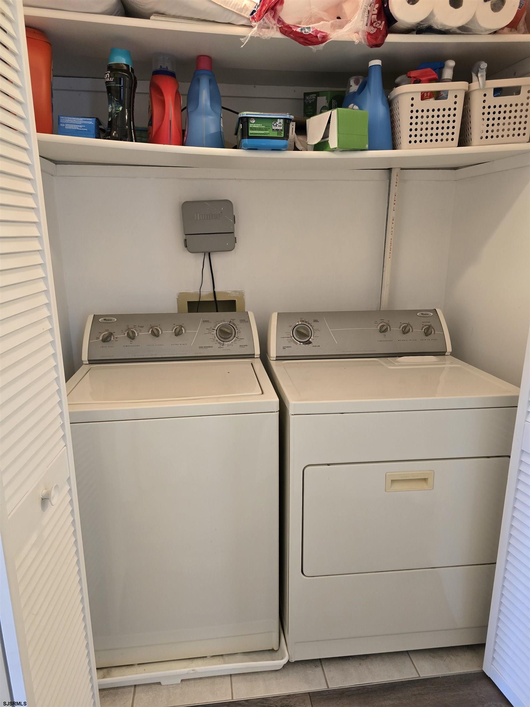 6 Lighthouse Cove, Unit A Brigantine, NJ 08203 - Photo 40 of 49 a utility room with dryer and washer